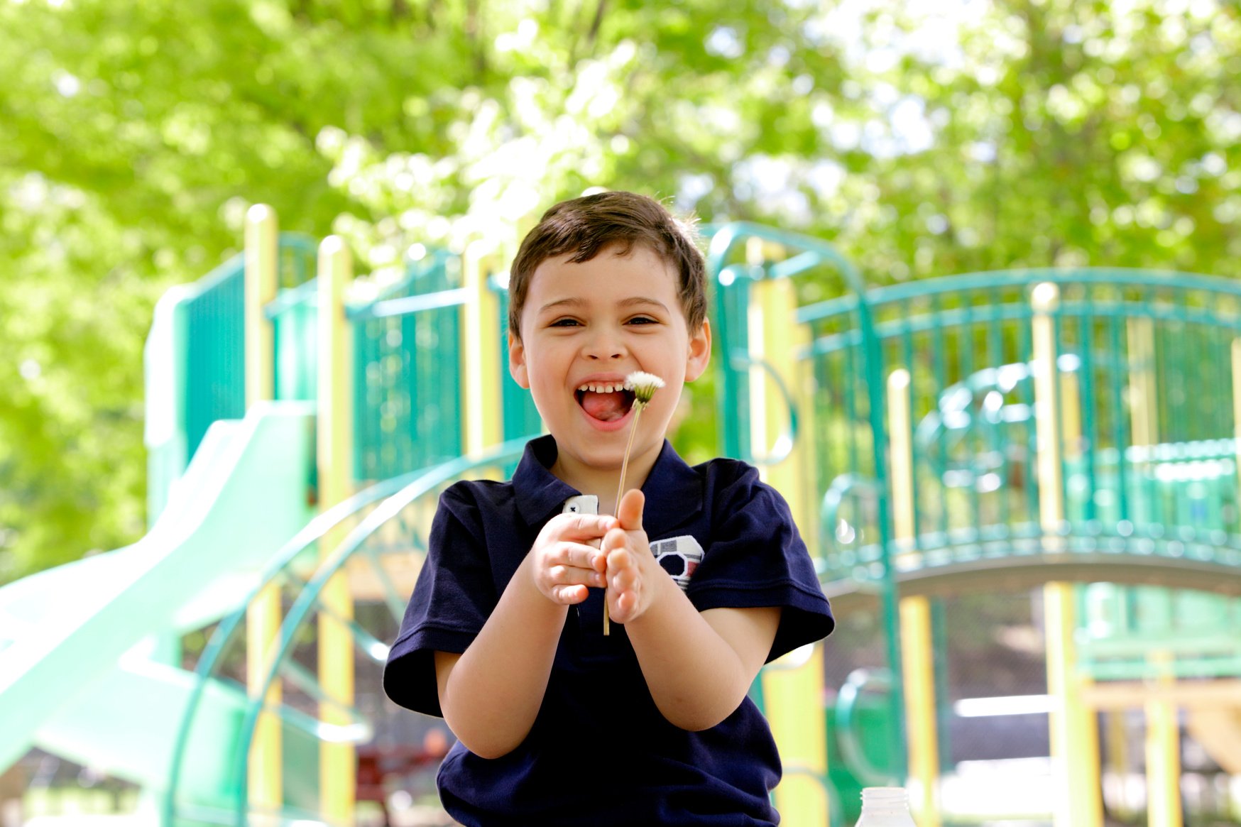 Young boy with autism laughing